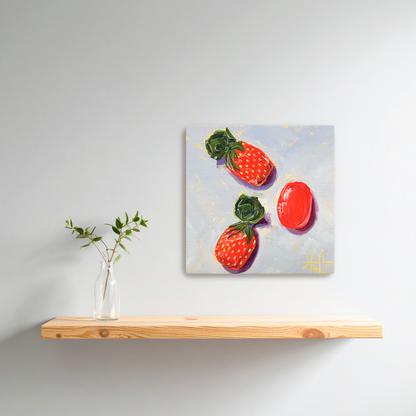Canvas print of strawberry candies on a wooden shelf against a light gray wall