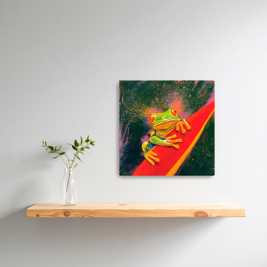 Framed artwork of a colorful tree frog on a red leaf above a wooden shelf with a plant.