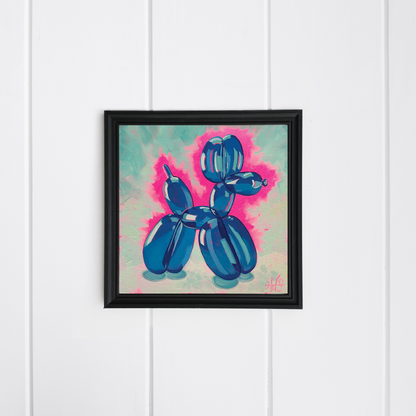 Framed artwork of a blue balloon dog on a white wooden panel background